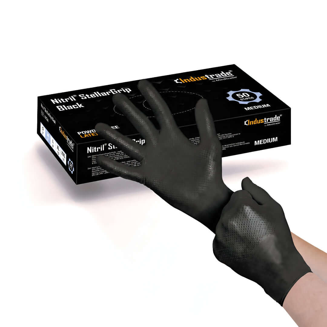 Meditrade StellarGrip Diamond Grip Nitrile Gloves 5.2Mil shown on hands with a box packaging for professional use.